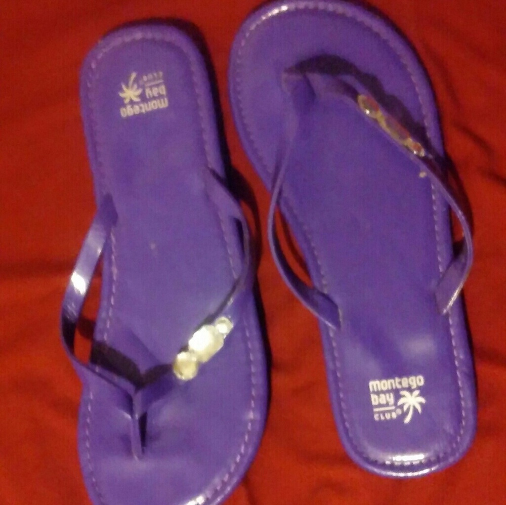 Purple flip flops